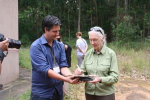 Jane Goodall signing first stone enclosure